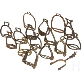 15 German iron and brass stirrups and one iron spore, 16th - 18th century