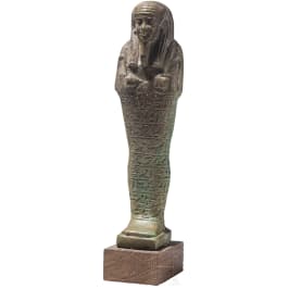 A faience ushabti with nine-line hieroglyphic inscription, 26th Dynasty (Saite Period), mid-1st millennium B.C.