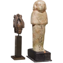 A stone Osiris head with Atef crown and a ushabti made of faience with painted inscription, Late Period, mid-1st millennium B.C.