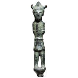 An Eastern Mediterranean bronze statuette of a warrior with horned helmet, 13th - 12th century B.C.