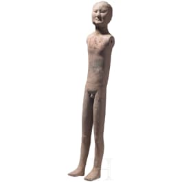 A Chinese painted clay figure of a standing nude man, Han Dynasty, circa 150 B.C.