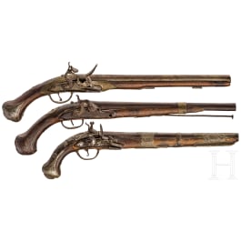 Two flintlock pistols and one percussion pistol, Balkan Turkish, 19th century.