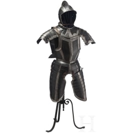 A South German black and white half armour with etched bands for a man-at-arms, circa 1560