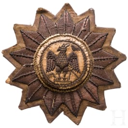 An embroidered fabric star with phoenix, 19th/20th century