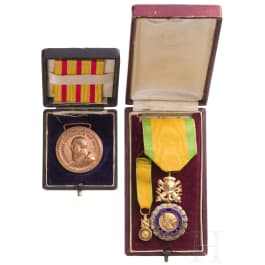 A cased French and Baden medal