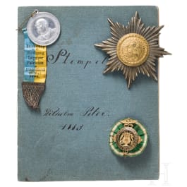 Three badges and a small collection of seals, 19th century