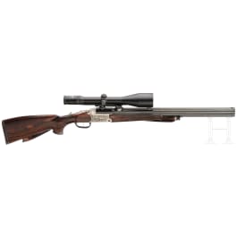 A combination gun Blaser BD 880 with Zeiss scope