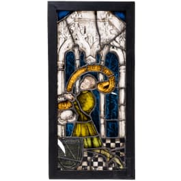A German leaded stained glass window showing a praying donor, mid 15th century