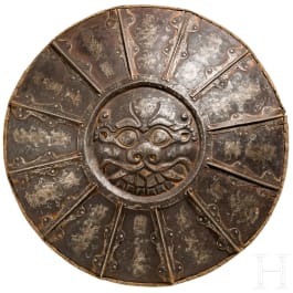 A Tibetan iron round shield, 19th century