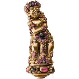A Bali kris handle in the form of Bataru Bayu with a star sapphire, circa 1900