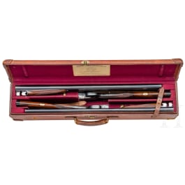 A pair of side-by-side shotguns by Stephen Grant & Sons, in case
