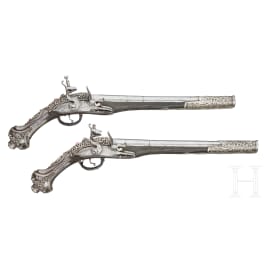 A pair of silver-mounted Balkan Turkish flintlock pistols, circa 1830