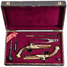 A pair of percussion travel pistols in a case, Brunon in Caen, circa 1780