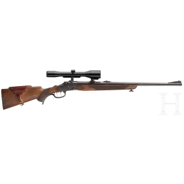 A falling block rifle .22 Hornet
