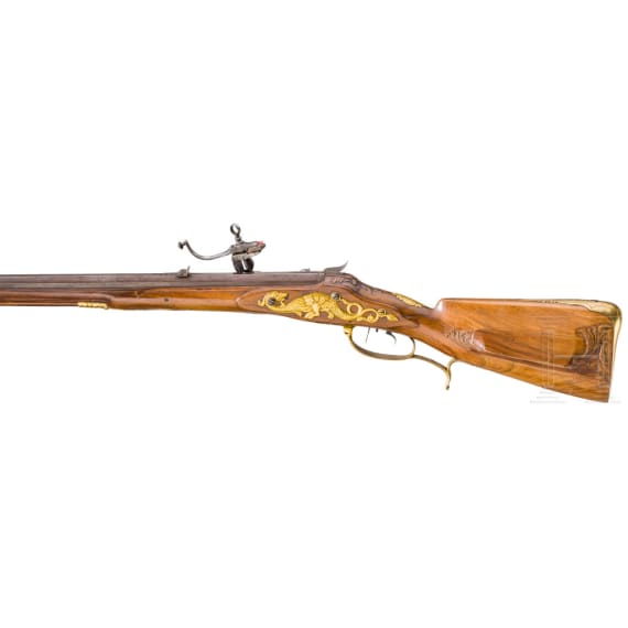A deluxe wheellock rifle, so-called "M&uuml;llerb&uuml;chse", with self-cocking wheellock, J.C. Schneider, Goslar, circa 1720