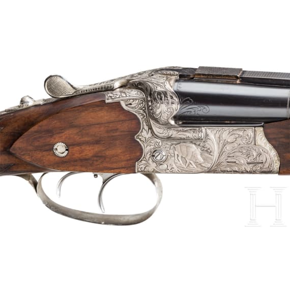 A cased double-rifle drilling, Suhl, with Zeiss scope