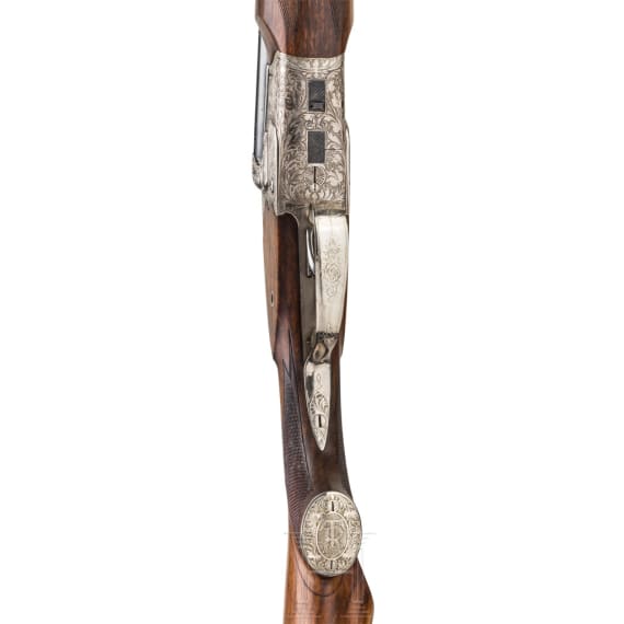 A cased double-rifle drilling, Suhl, with Zeiss scope