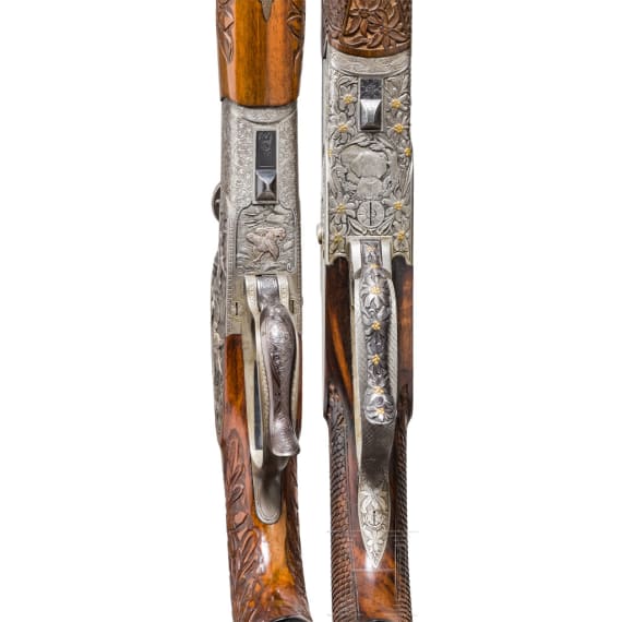 A Scheiring-D&uuml;sel over-and-under drilling, Ferlach, with Zeiss scope and a Scheiring bergstutzen with Schmidt & Bender scope