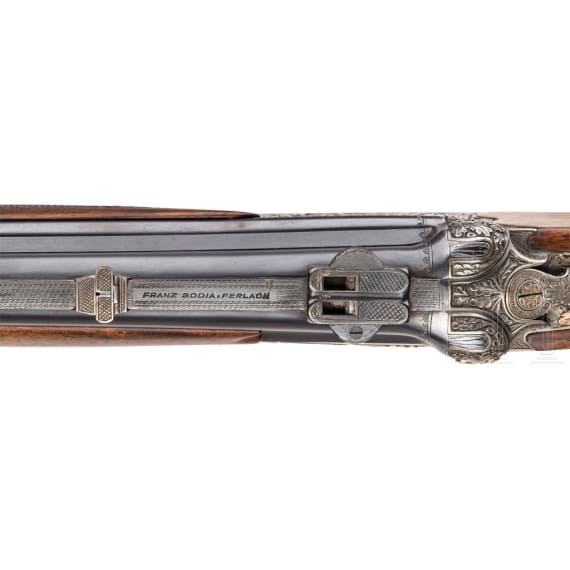 A triple barrel combination gun, Franz Sodia, Ferlach, with Zeiss scope, in a case