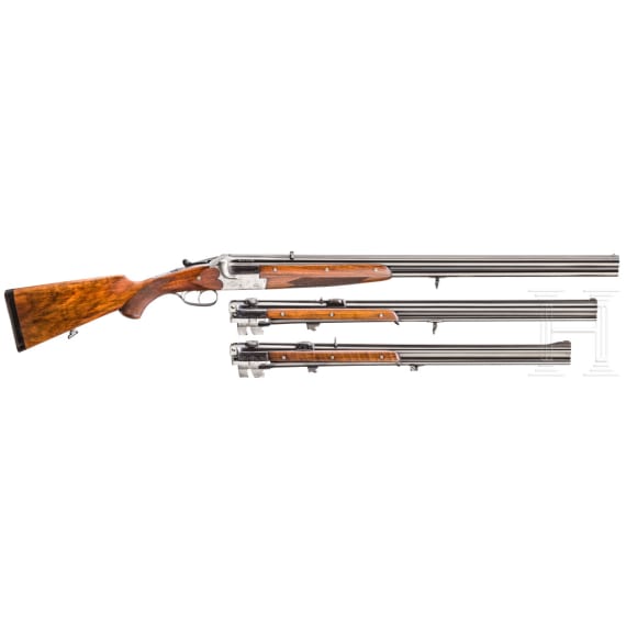 A Merkel over-and-under rifle with Zeiss scope, interchangeable O/U combination barrel with Zeiss scope, interchangeable O/U shotgun barrel
