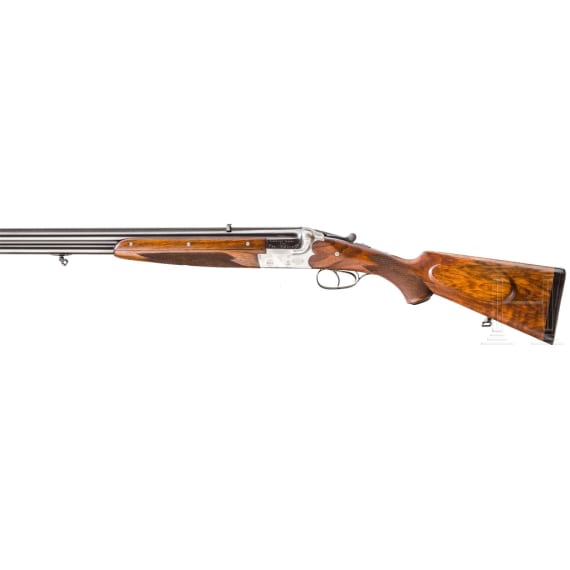 A Merkel over-and-under rifle with Zeiss scope, interchangeable O/U combination barrel with Zeiss scope, interchangeable O/U shotgun barrel