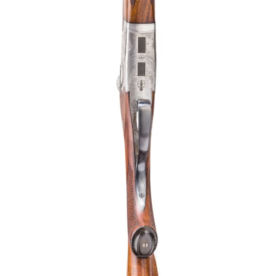 A Merkel over-and-under rifle with Zeiss scope, interchangeable O/U combination barrel with Zeiss scope, interchangeable O/U shotgun barrel