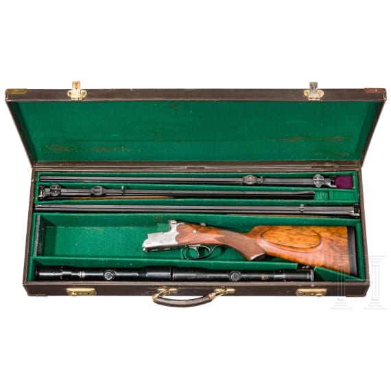 A Merkel over-and-under rifle with Zeiss scope, interchangeable O/U combination barrel with Zeiss scope, interchangeable O/U shotgun barrel