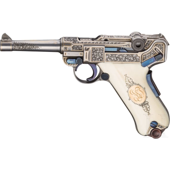 A Mauser Parabellum 06/73 engraved with English arabesques, in case with accessories