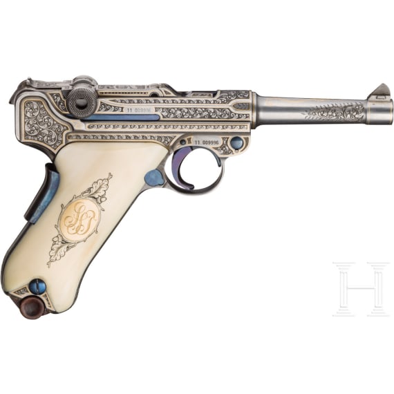 A Mauser Parabellum 06/73 engraved with English arabesques, in case with accessories