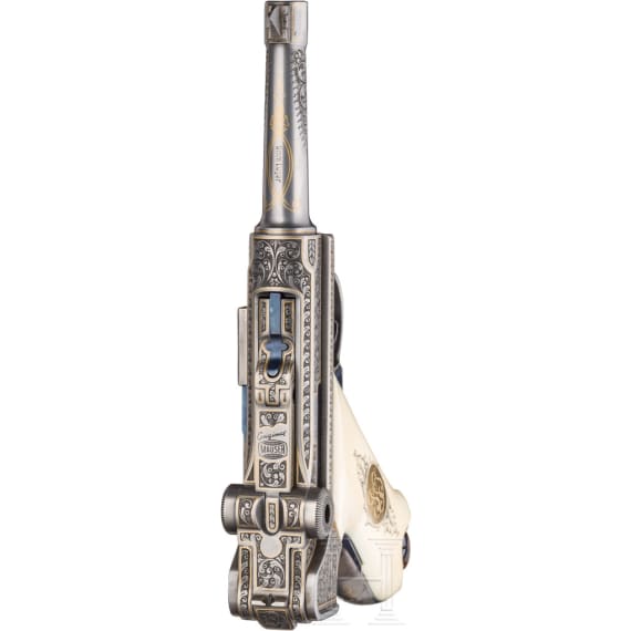 A Mauser Parabellum 06/73 engraved with English arabesques, in case with accessories
