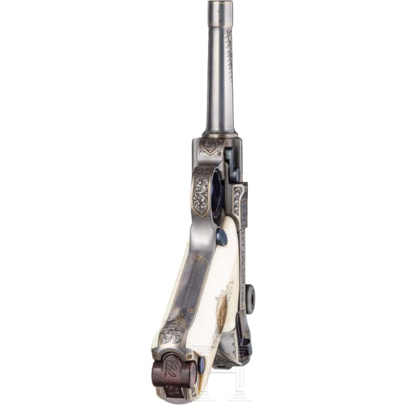 A Mauser Parabellum 06/73 engraved with English arabesques, in case with accessories