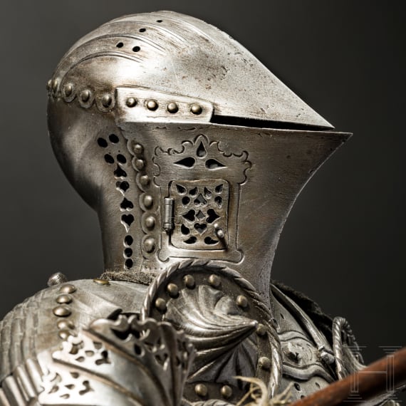 A miniature suit of jousting armour, made by the artisan smith Schneider of Munich before 1923