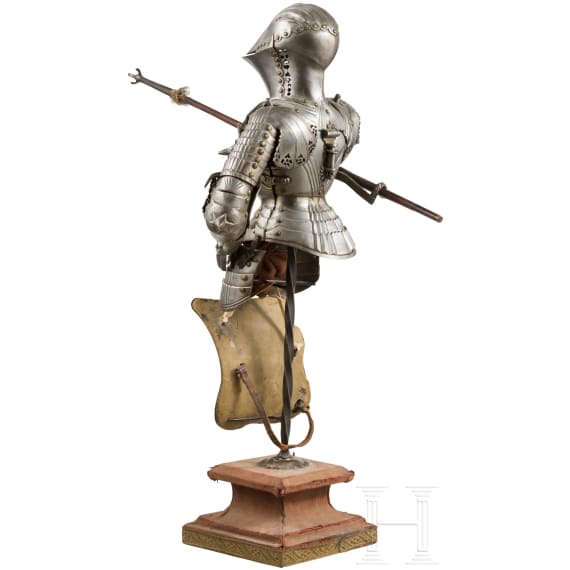 A miniature suit of jousting armour, made by the artisan smith Schneider of Munich before 1923