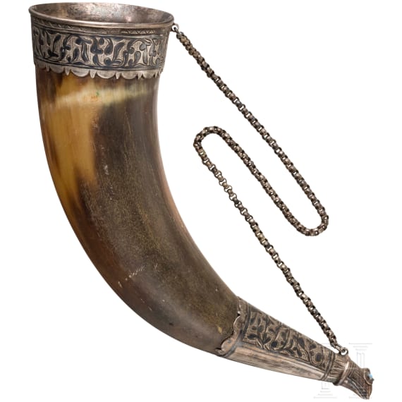 A small, silver mounted and nielloed drinking horn, Caucasus, around 1900
