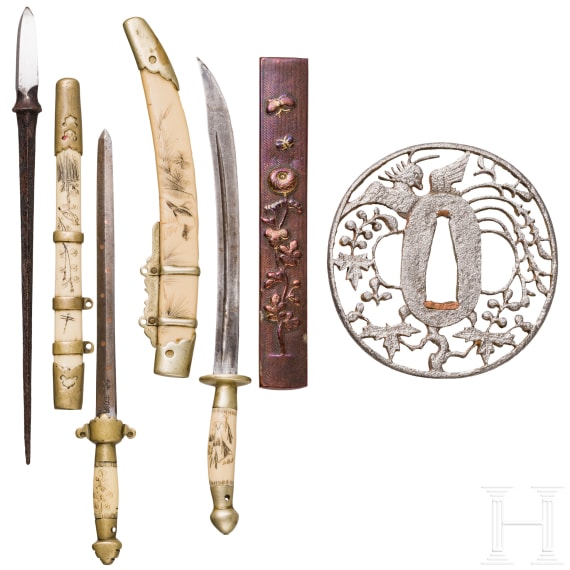 A Tsuba, a Kozuka, an arrowhead and two miniature swords, Japan, Edo period