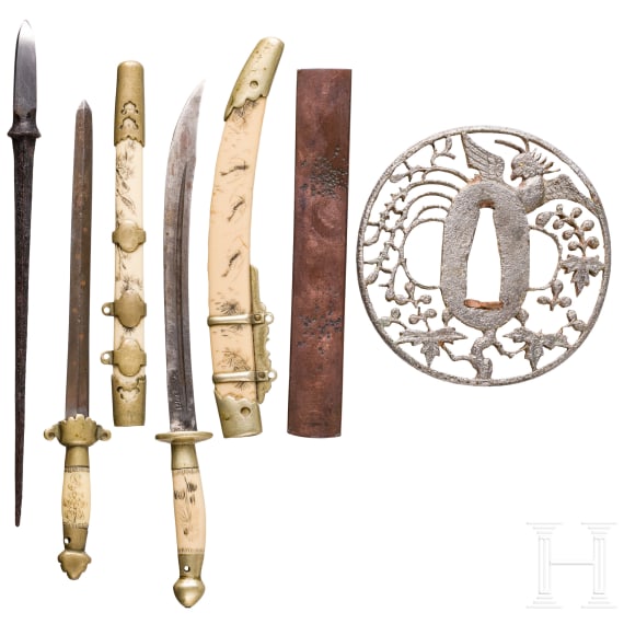A Tsuba, a Kozuka, an arrowhead and two miniature swords, Japan, Edo period