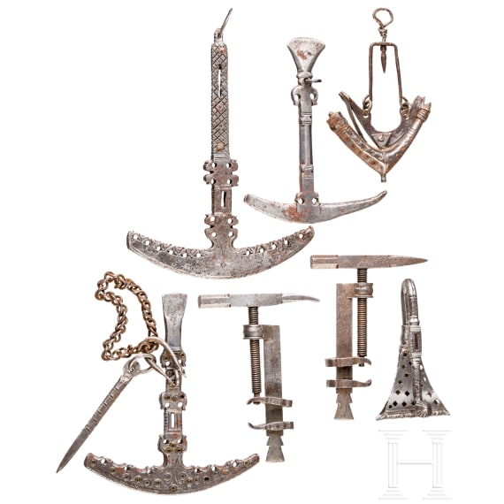 A group of Afghan combination tools and belt pendants, 19th century