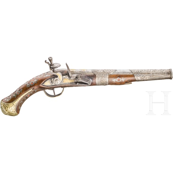An Algerian silver-mounted and coral-decorated flintlock pistol, 19th century