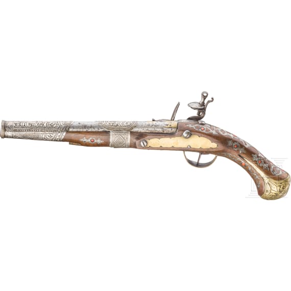 An Algerian silver-mounted and coral-decorated flintlock pistol, 19th century