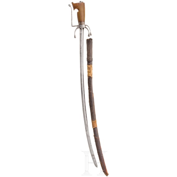 A Moroccan nimcha with a rhinoceros horn grip, 19th century