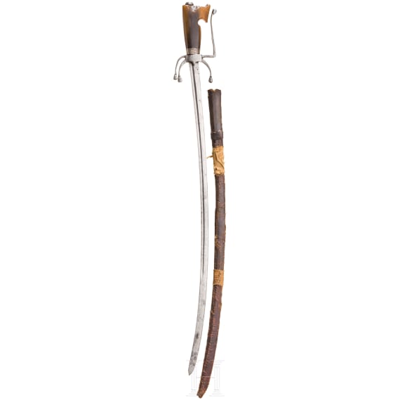 A Moroccan nimcha with a rhinoceros horn grip, 19th century