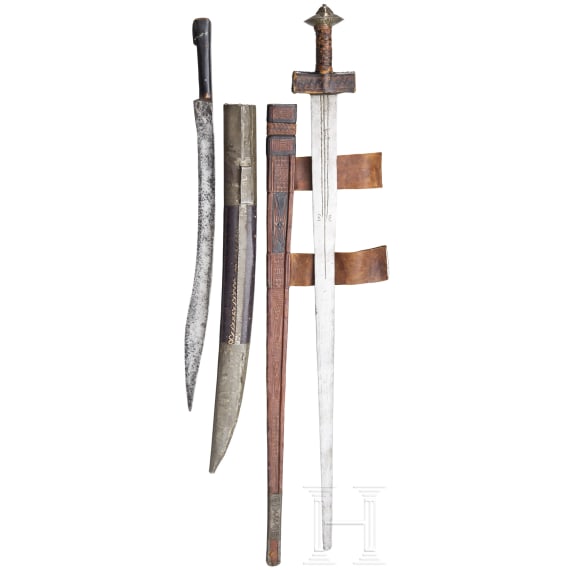 A Tuareg sword and yatagan, North Africa, 20th and 19th century respectively