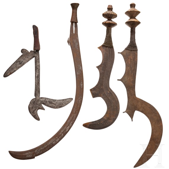 A sabre weapon of the Benge, a throwing knife of the Zande and two Ngombe swords