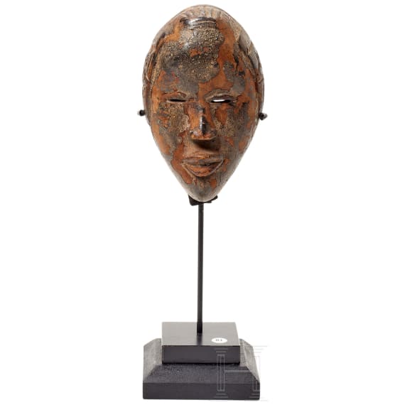 A miniature mask of the Dan tribe, Liberia