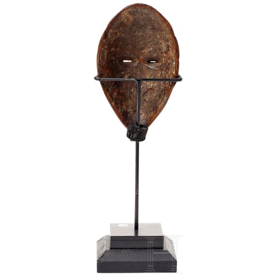 A miniature mask of the Dan tribe, Liberia