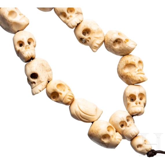 A Tibetan skull necklace, circa 1900