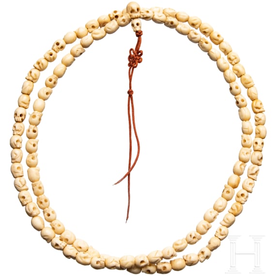 A Tibetan skull necklace, circa 1900