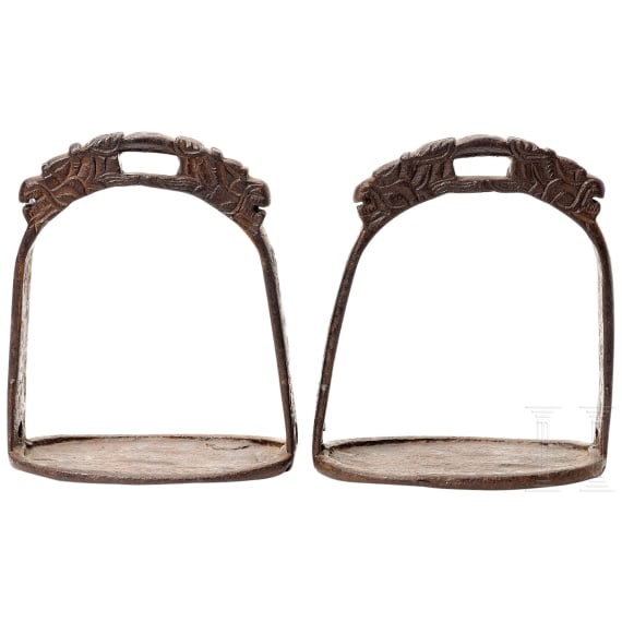 A pair of Chinese iron stirrups, 17th-18th century