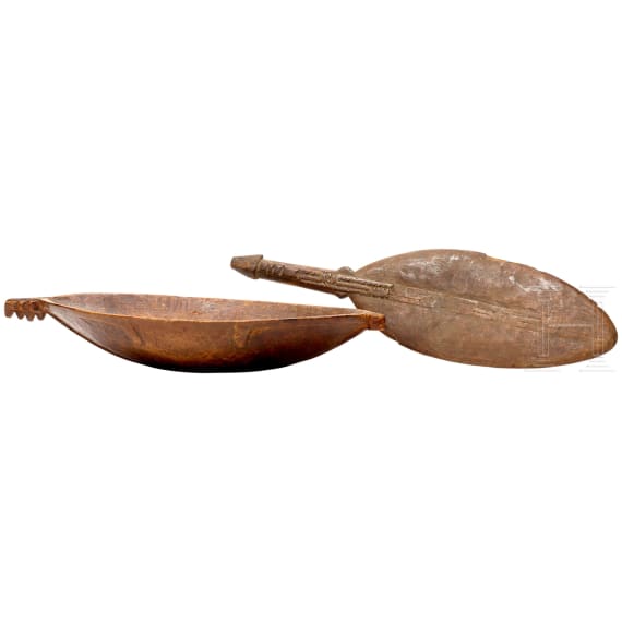 A wooden bowl and a dancepaddle, Papua New Guinae