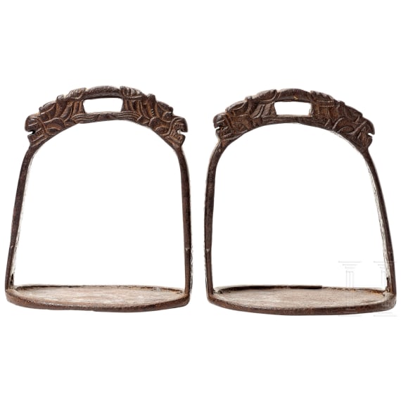 A pair of Chinese iron stirrups, 17th-18th century